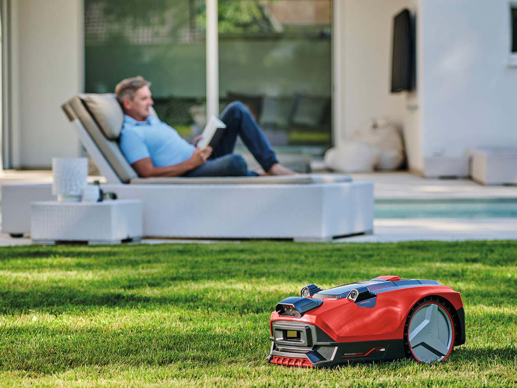 A robotic lawn mower is working