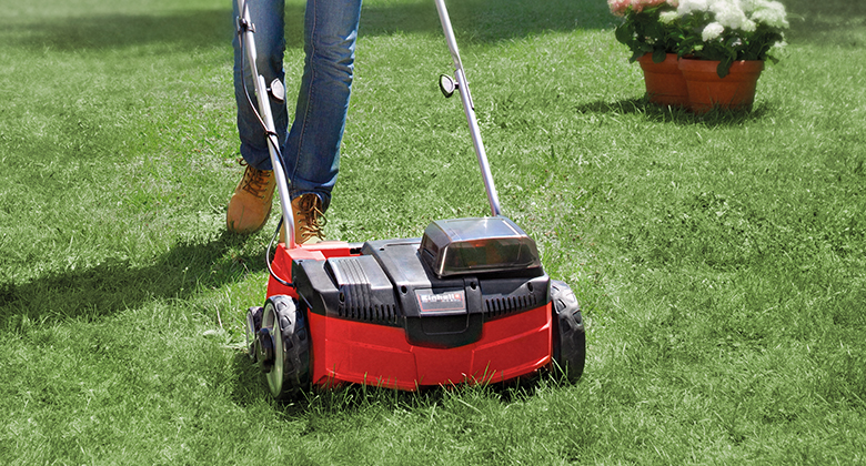 Scarifier in use in the garden